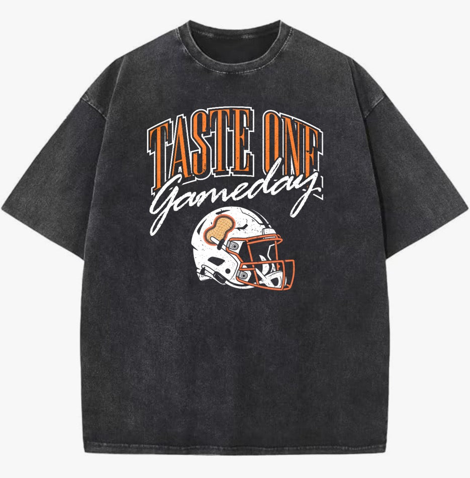 Taste One Gameday Tee — vintage black, collegiate arch with helmet graphic